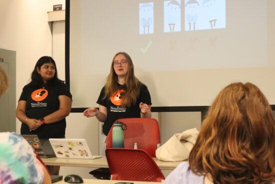 Neutrino team members presenting about poise and posture.